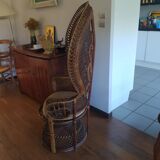 Emmanuelle rattan armchair from the 70s, Peacock model