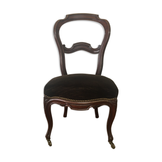 Wheeled style chair