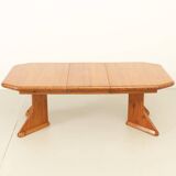 Large extendable Danish dining table in solid pine, 1970s.