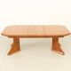Large extendable Danish dining table in solid pine, 1970s.