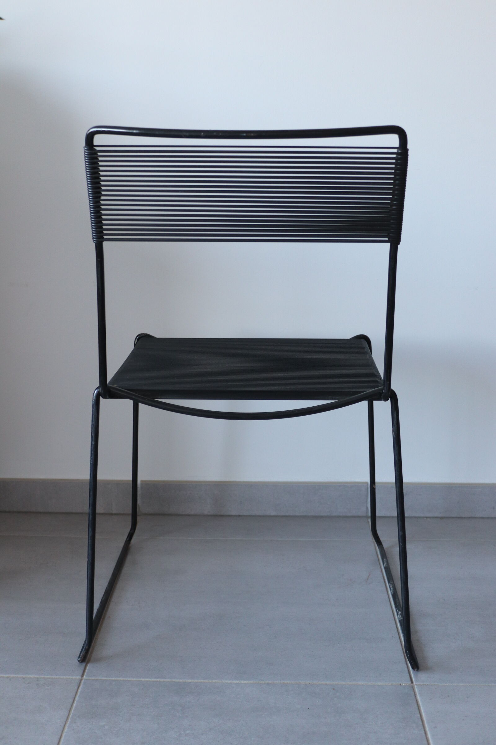 Black chair Spaghetti Giandomenico Belotti for fly line