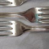 set of 12 Table Forks Christofle model "pearls" in silver metal of the 60s