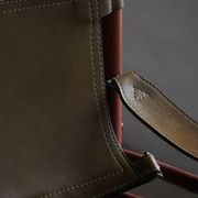 Arne Norell, Pair of "Sirocco" Safari armchairs in ash and green leather, 1960s.