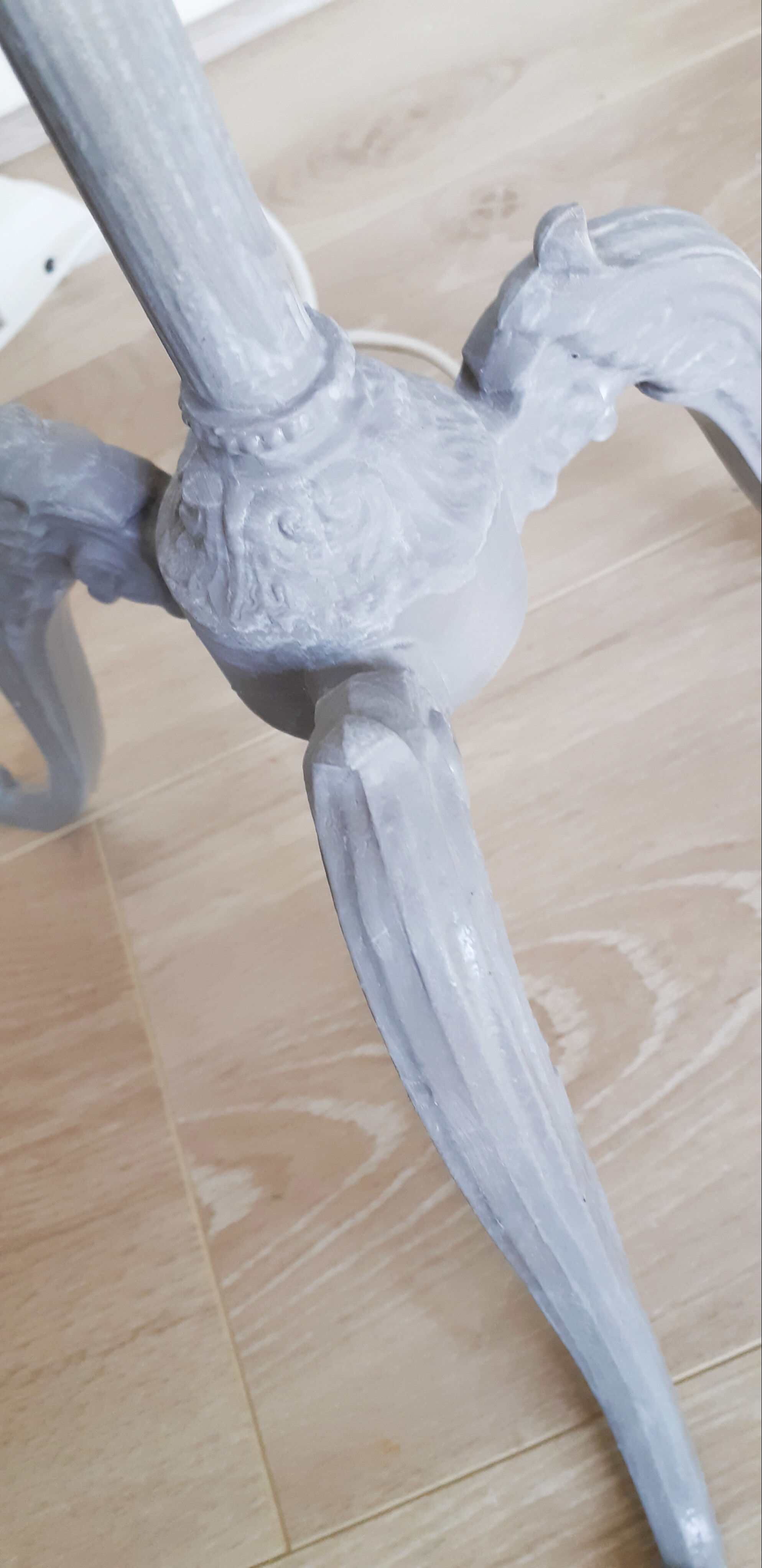 Brass tripod lamppost