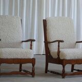 Modern Danish design, a pair of high-backed armchairs in oak and lambswool, 1950s.