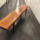 Wooden yew timbered bench stamped Reynolds of Ludlow, circa 1960
