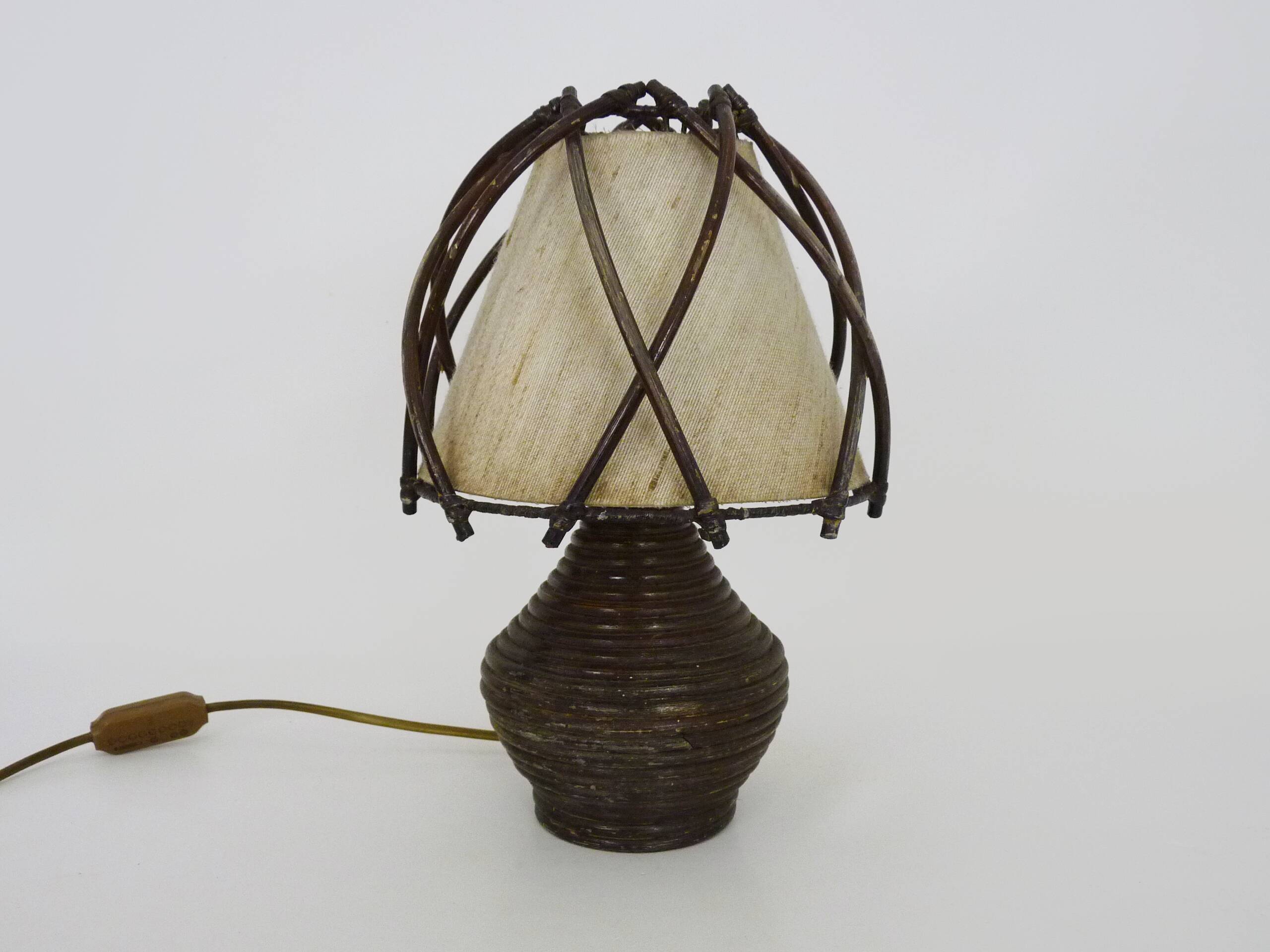 Bedside lamp, table lamp in rattan, bamboo Louis Sognot. 50s