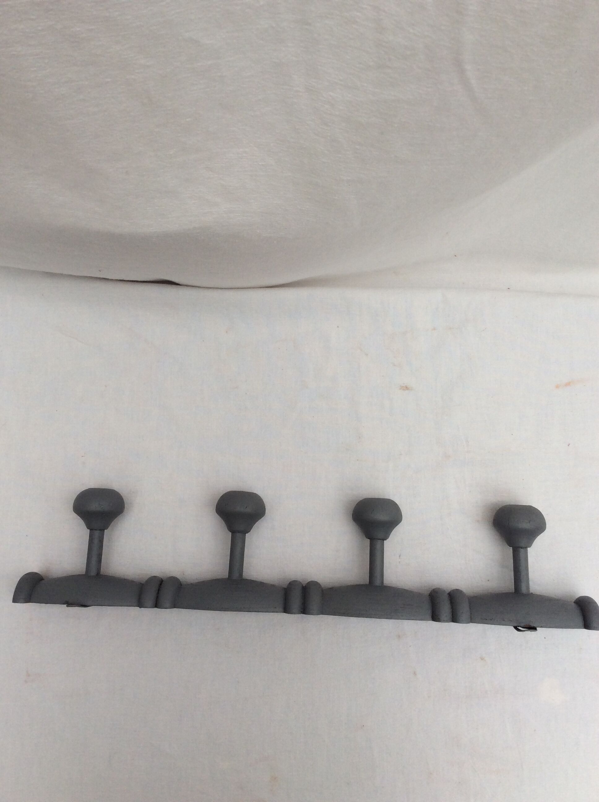 Grey wooden coat rack