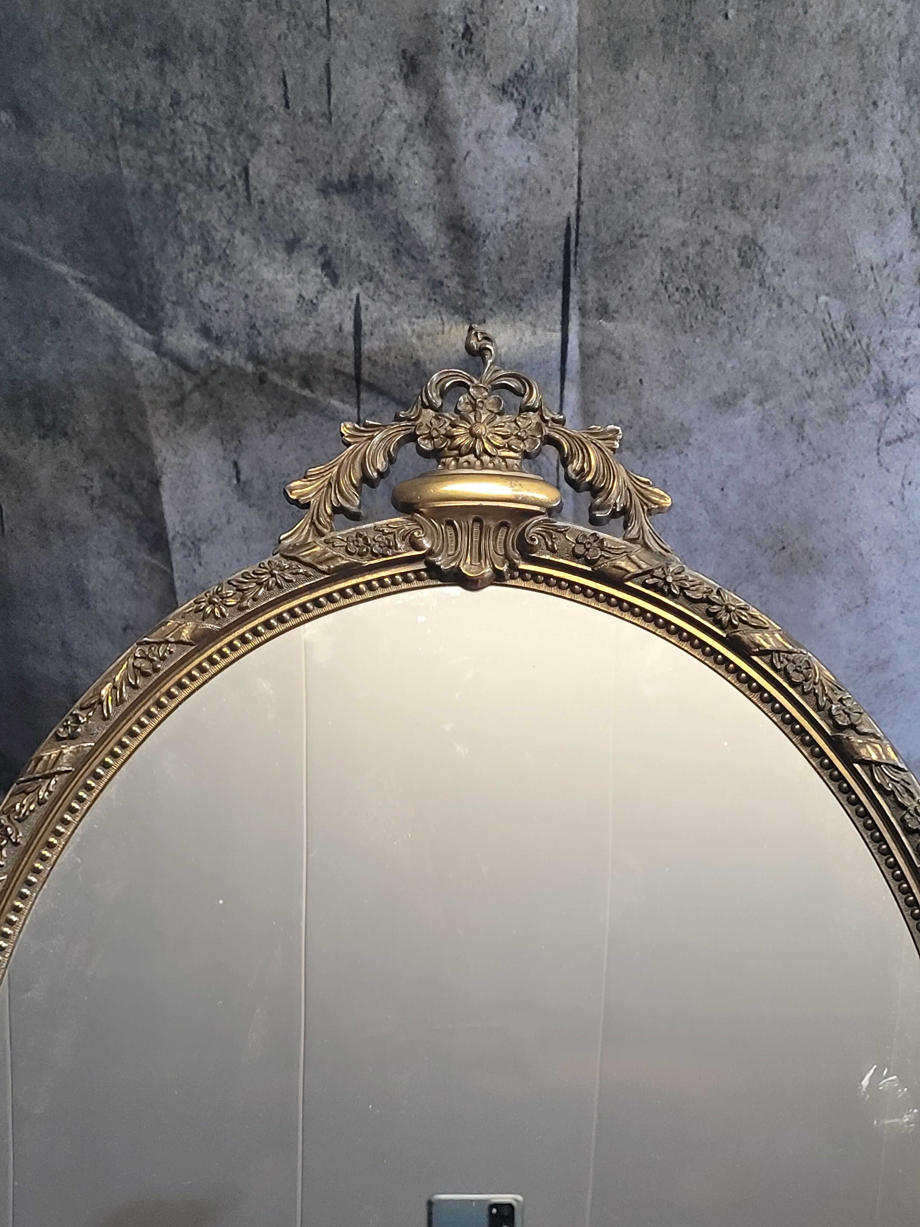 Gilded metal mirror in Louis XV style