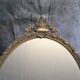 Miroir en métal doré de style Louis XV
