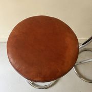 Bar stools in tubular chrome and tan leather, 1970s