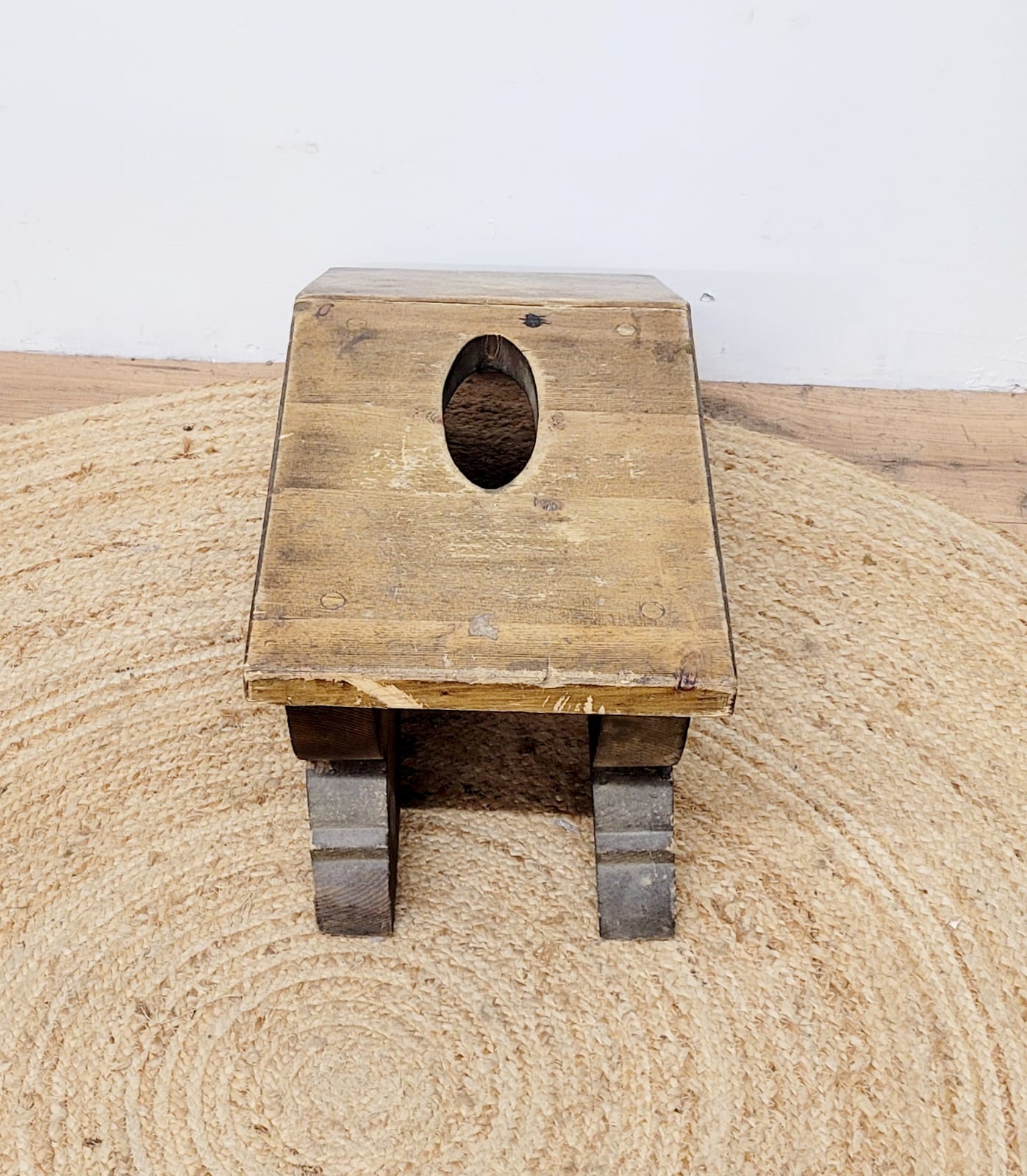 Old wooden footrest stool
