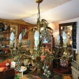 Gilded brass chandelier and silver lily of the valley bells