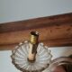 Old vintage wall lamp, brass glass and fake candle mirror
