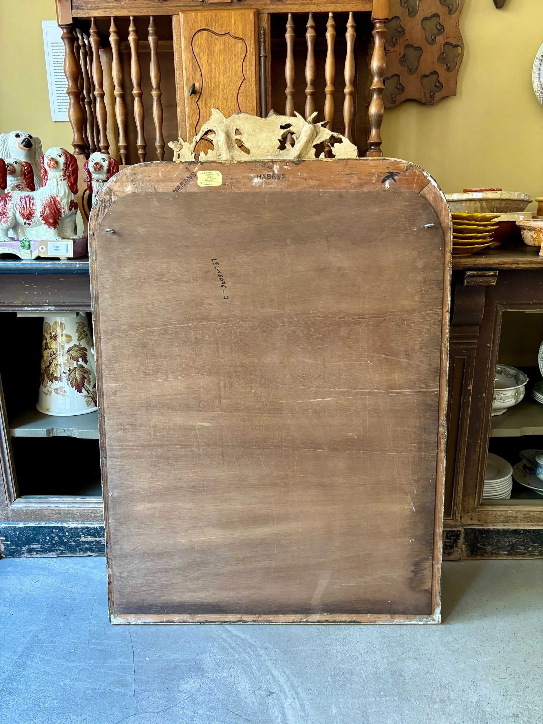 Gold sculpted and moulded stucco trumeau mirror 113 x 78 cm