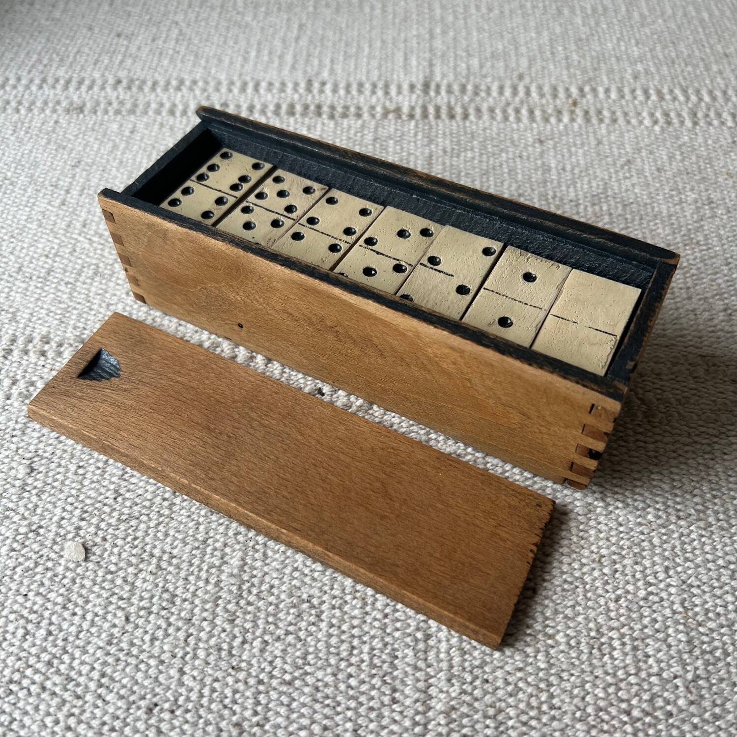 Box of wooden dominoes