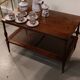 Coffee table / side table in mahogany with a rattan shelf.