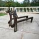 Zoomorphic buff brass and cast iron andirons
