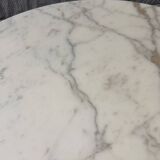 Tulip dining table in marble by Eero Saarinen for Knoll International.