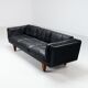 Illum Wikkelso model V11 sofa in black leather by Holger Christiansen, Denmark, 1960