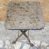 Old industrial folding steel stool