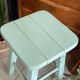 Old almond green wooden stool