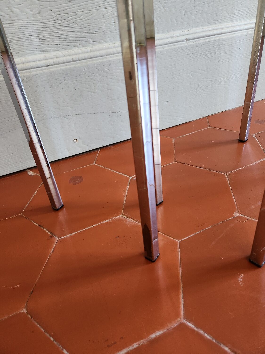3 nesting tables from the 1970s in smoked glass.