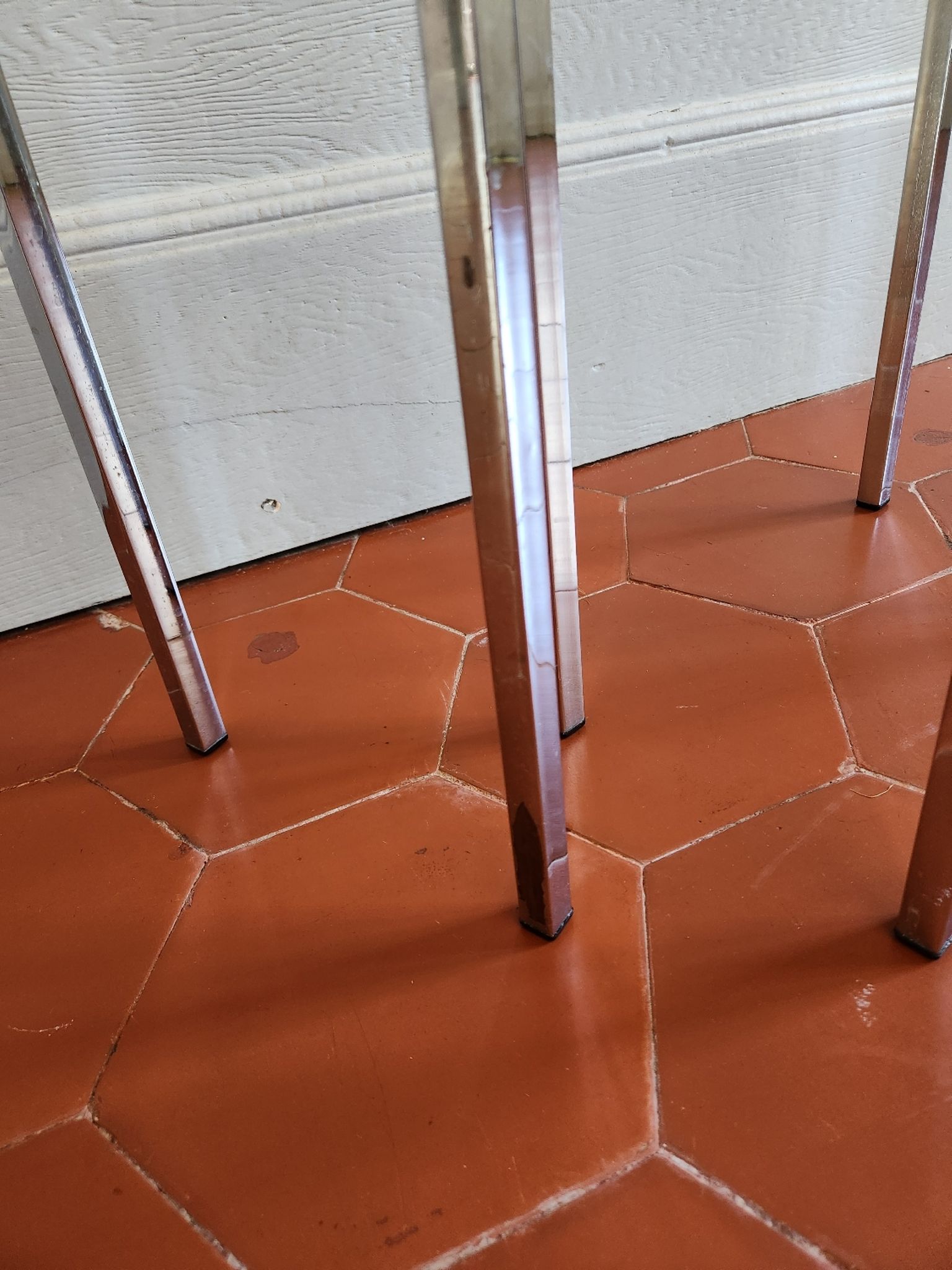 3 nesting tables from the 1970s in smoked glass.