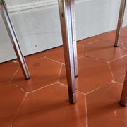 3 nesting tables from the 1970s in smoked glass.
