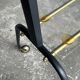 Black brass and glass mid-century trolley with sculptural legs — two-tier vintage bar cart
