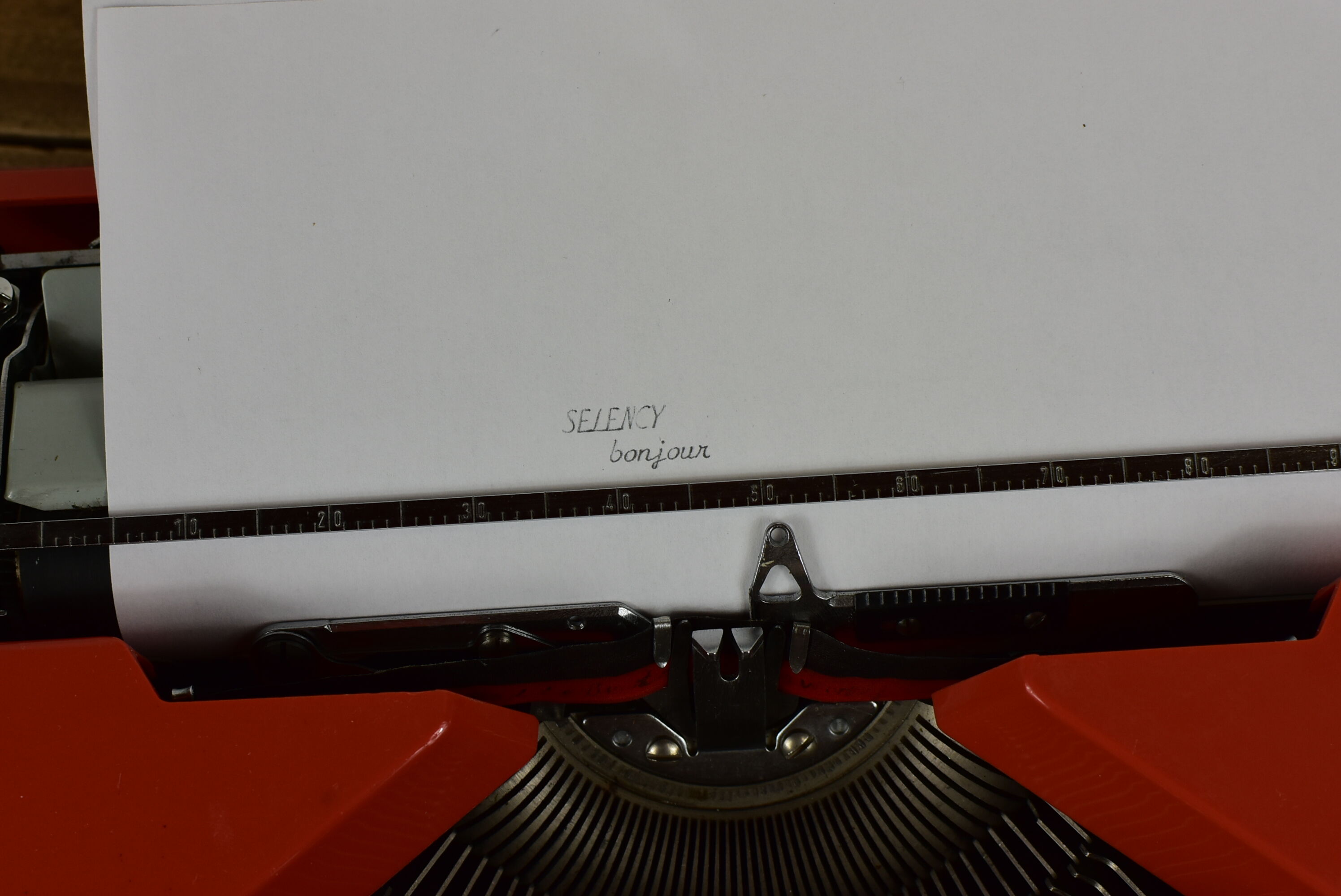 Hermès Baby orange typewriter.