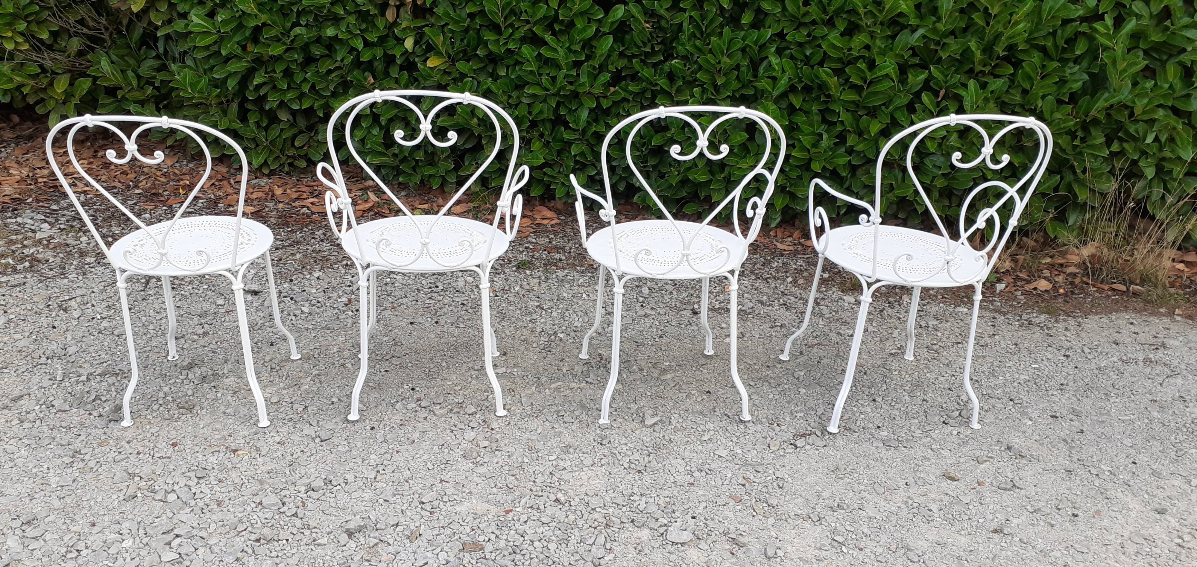 Old white wrought iron garden room