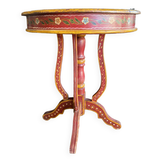 Pedestal table in polychrome wood and gold metal veneer