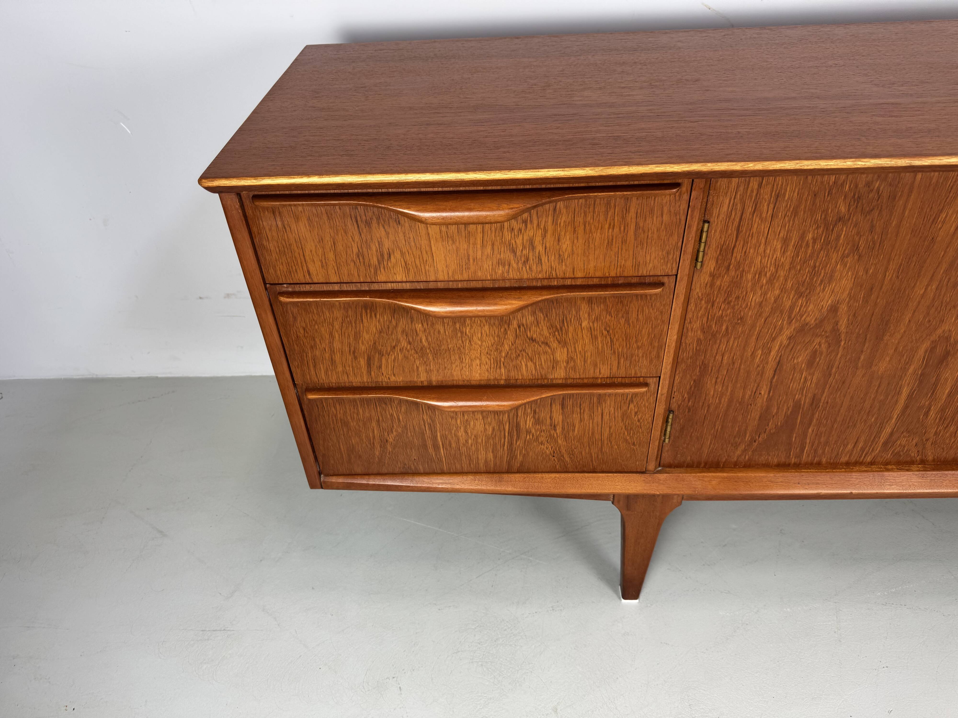 Vintage sideboard by Jentique from the 1960s .