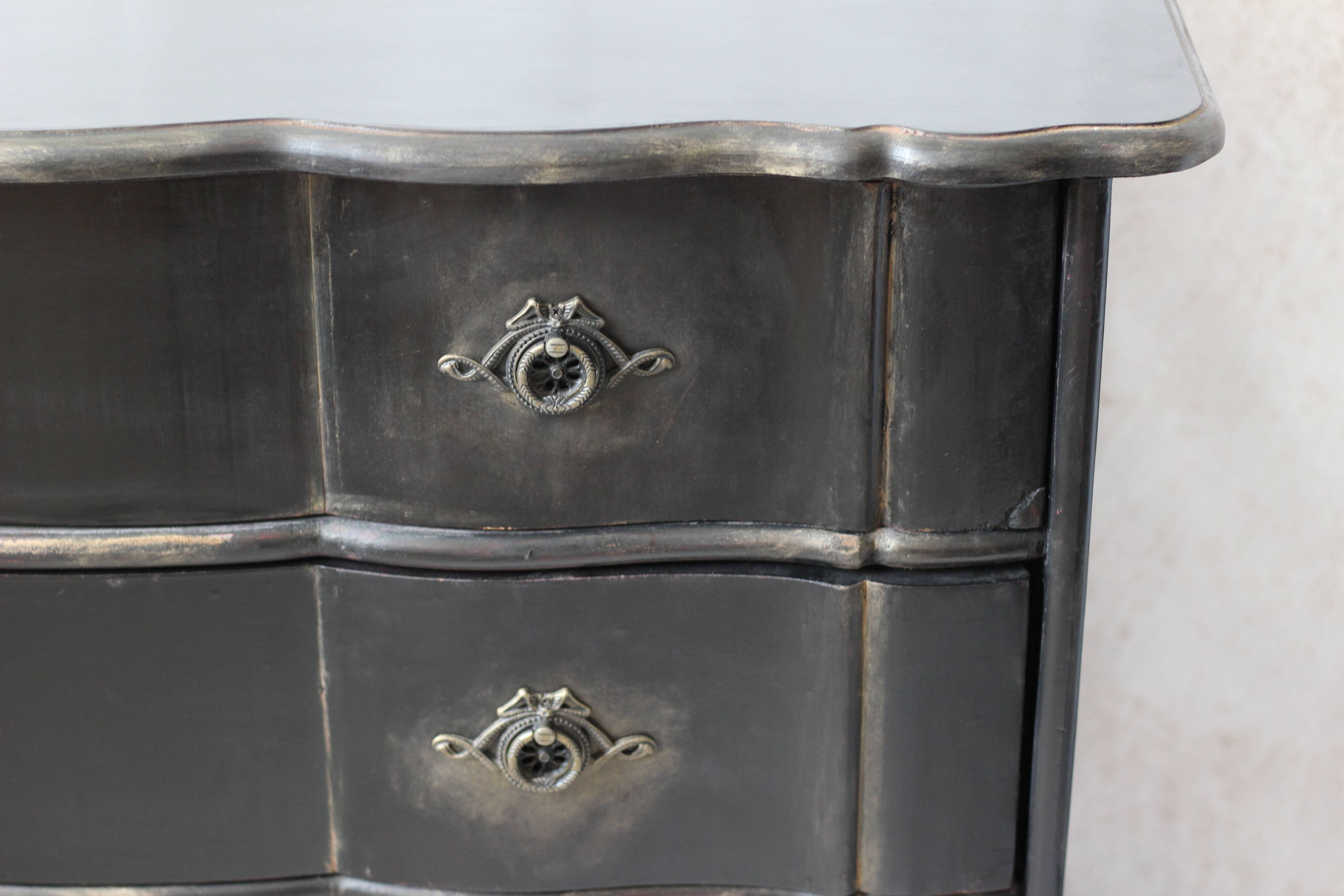 Victorian style black patinated crossbow chest of drawers