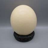Ostrich egg on pedestal