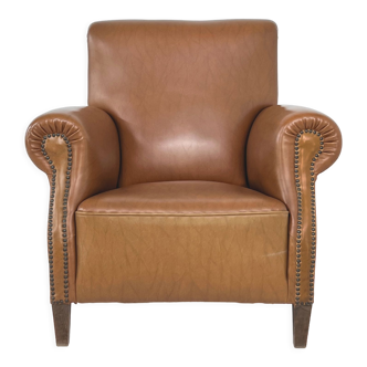 Club armchair of the 50s in imitation leather and wood