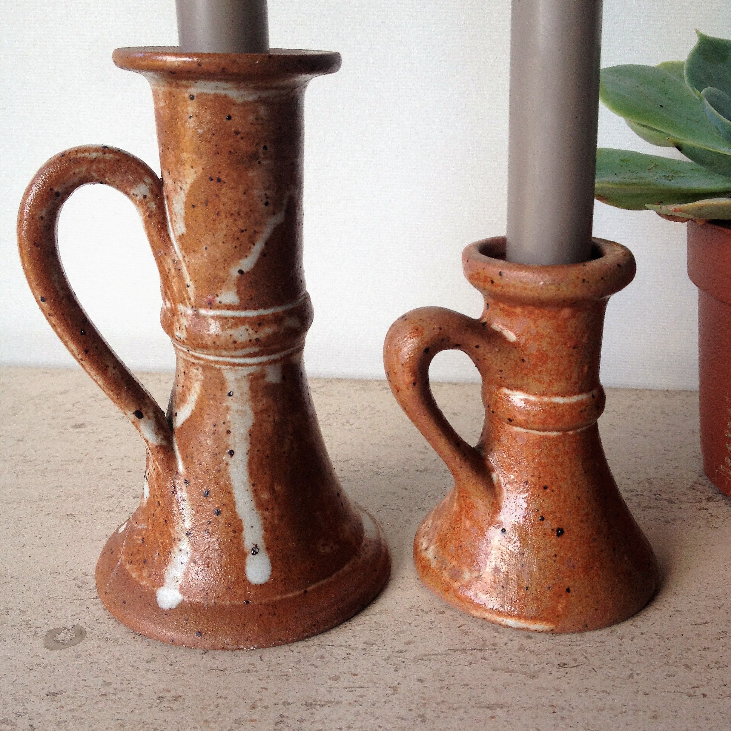 Pair of candlesticks in glazed stoneware