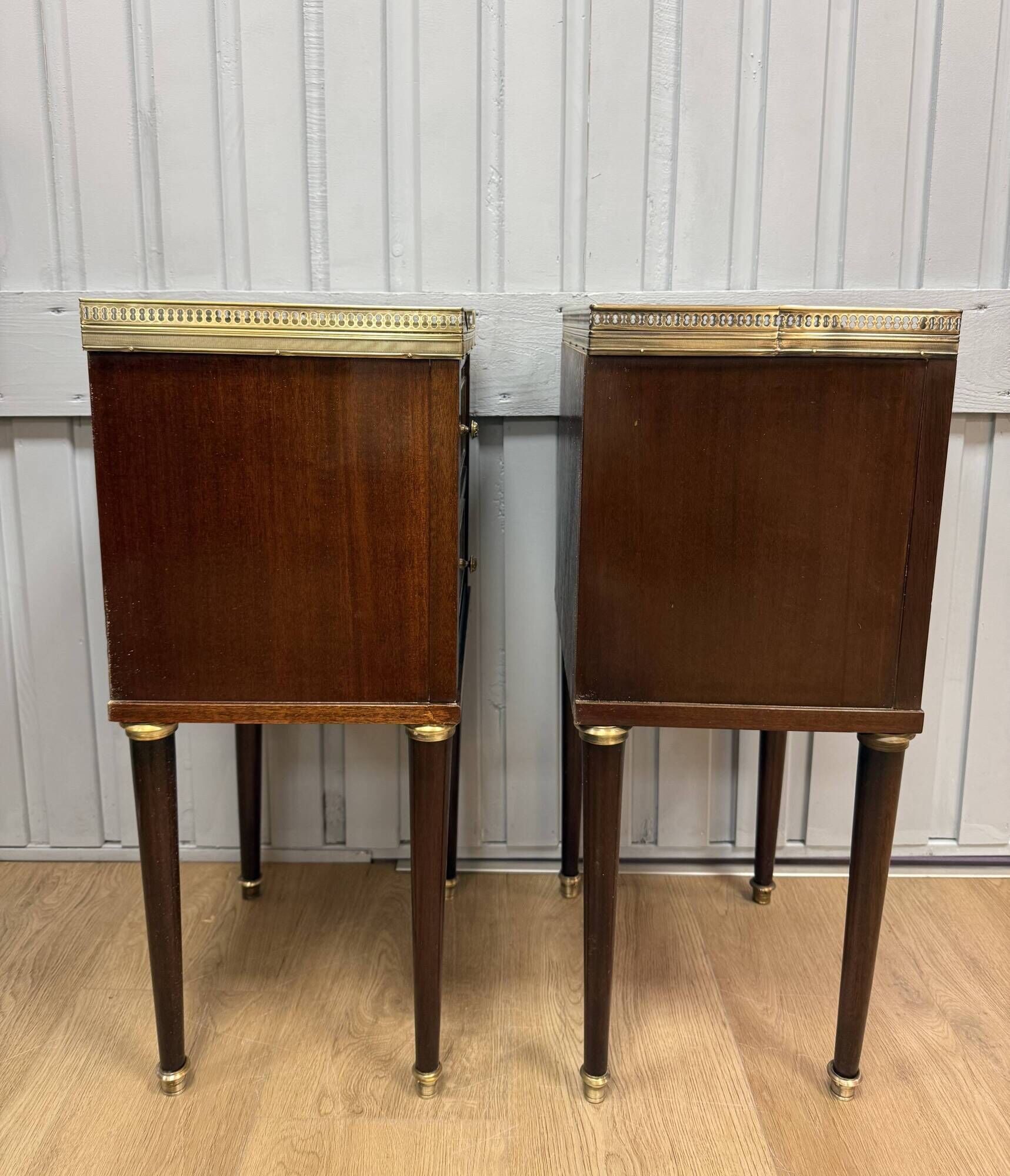 Pair of Louis XVI style bedside tables in mahogany