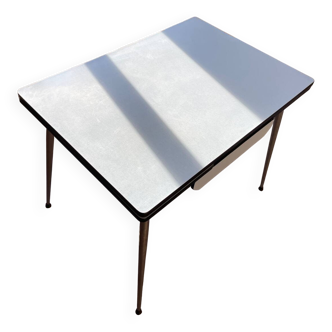 Blue Formica table for 4 to 6 people