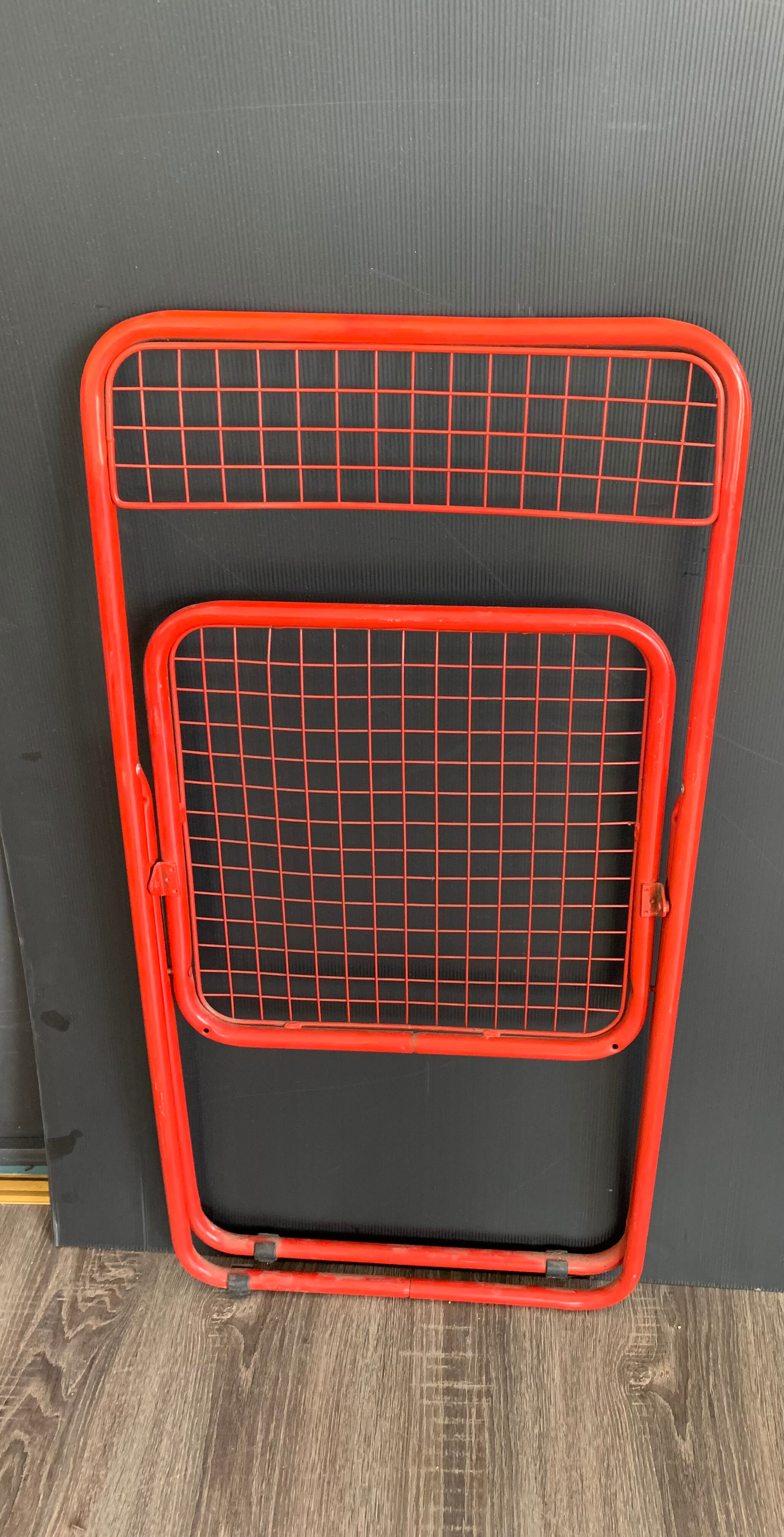 Red "Ted Ned" folding chair by Niels Gammelgaard