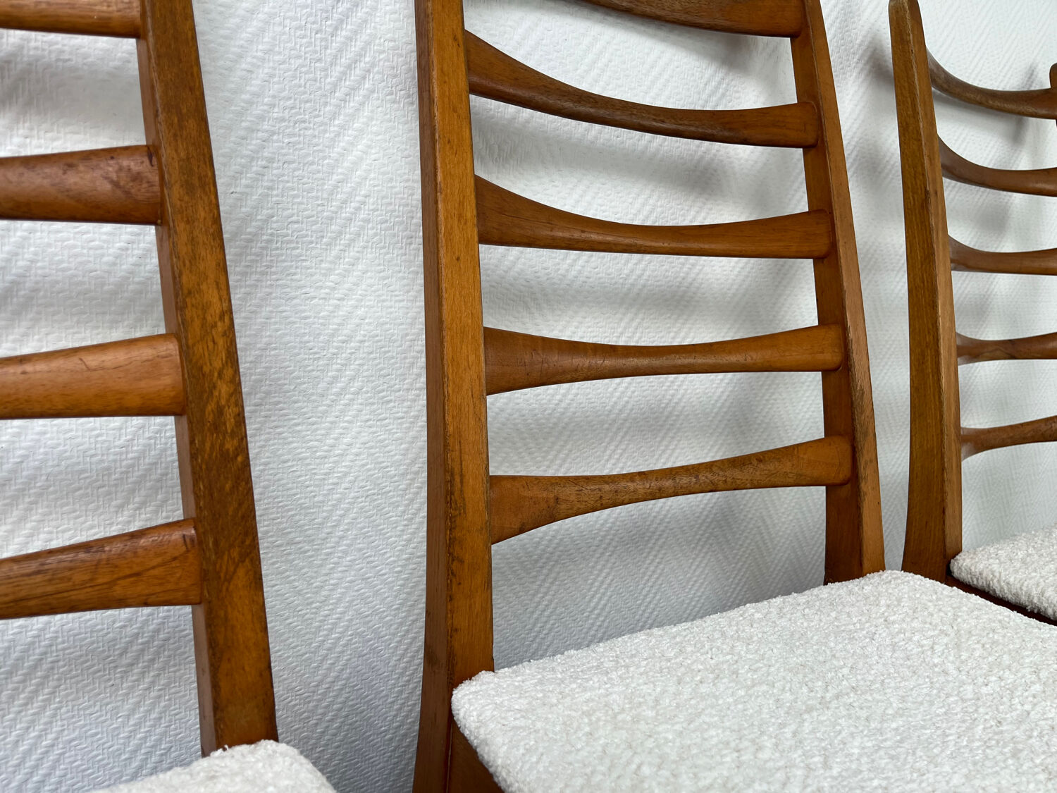 4 Scandinavian chairs, teak with boucle seats.