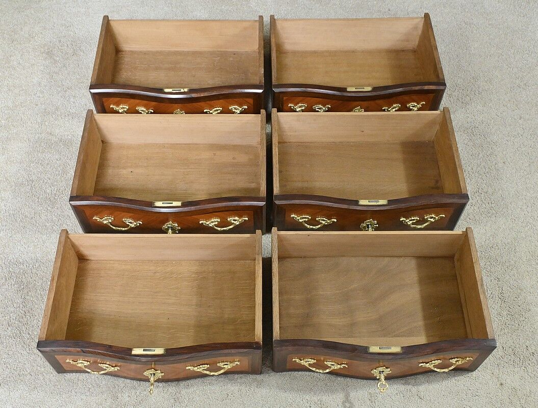 Rosewood and rosewood marquetry chest of drawers, Louis XV style – 2nd half of the 19th century.