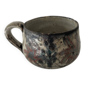 Handcrafted mug with floral decoration