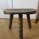 Brutalist-style wooden tripod