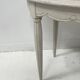 Art Deco style guéridon in patinated beech, 20th century.