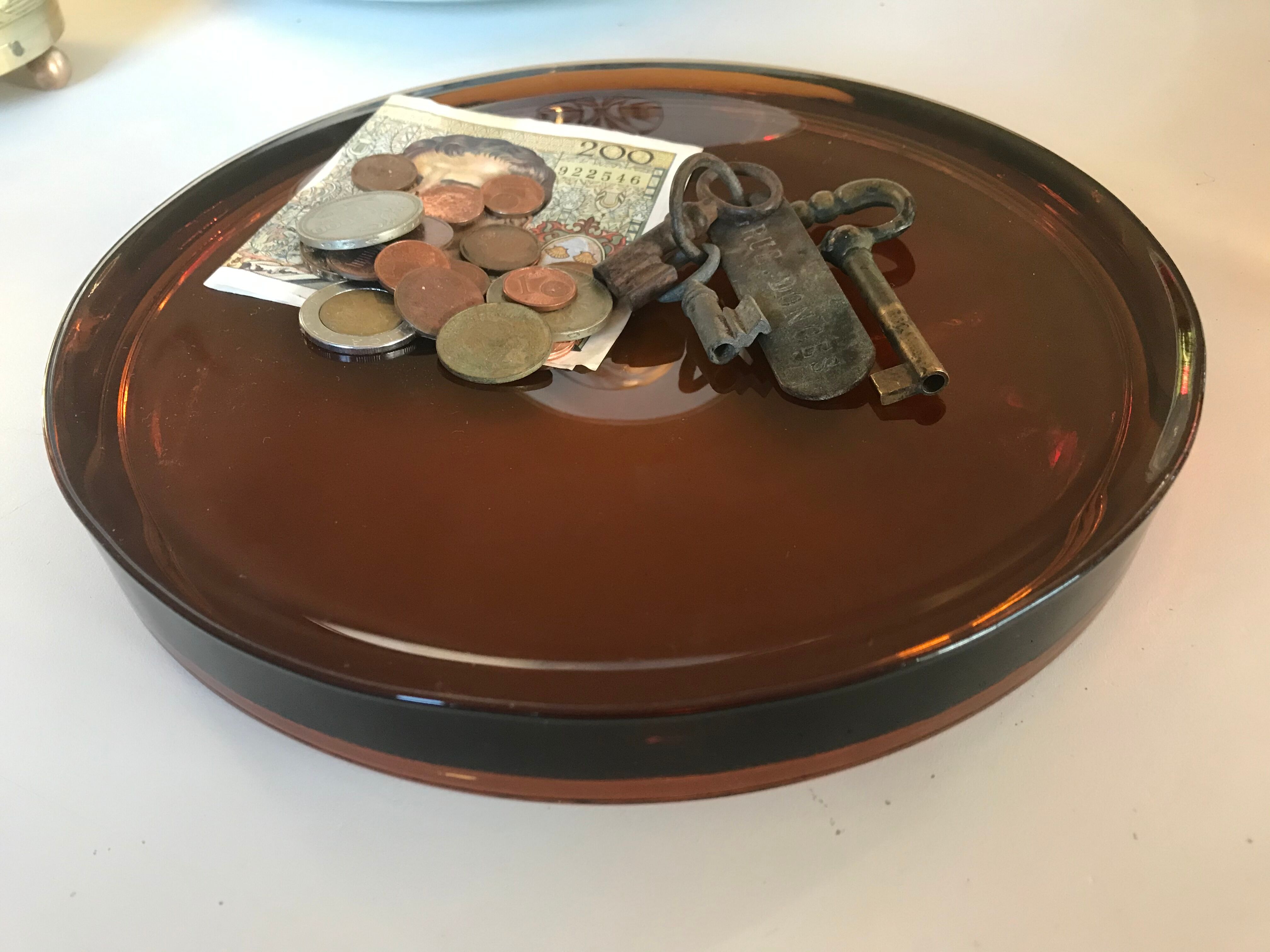 Empty vintage amber glass pocket