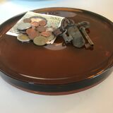 Empty vintage amber glass pocket