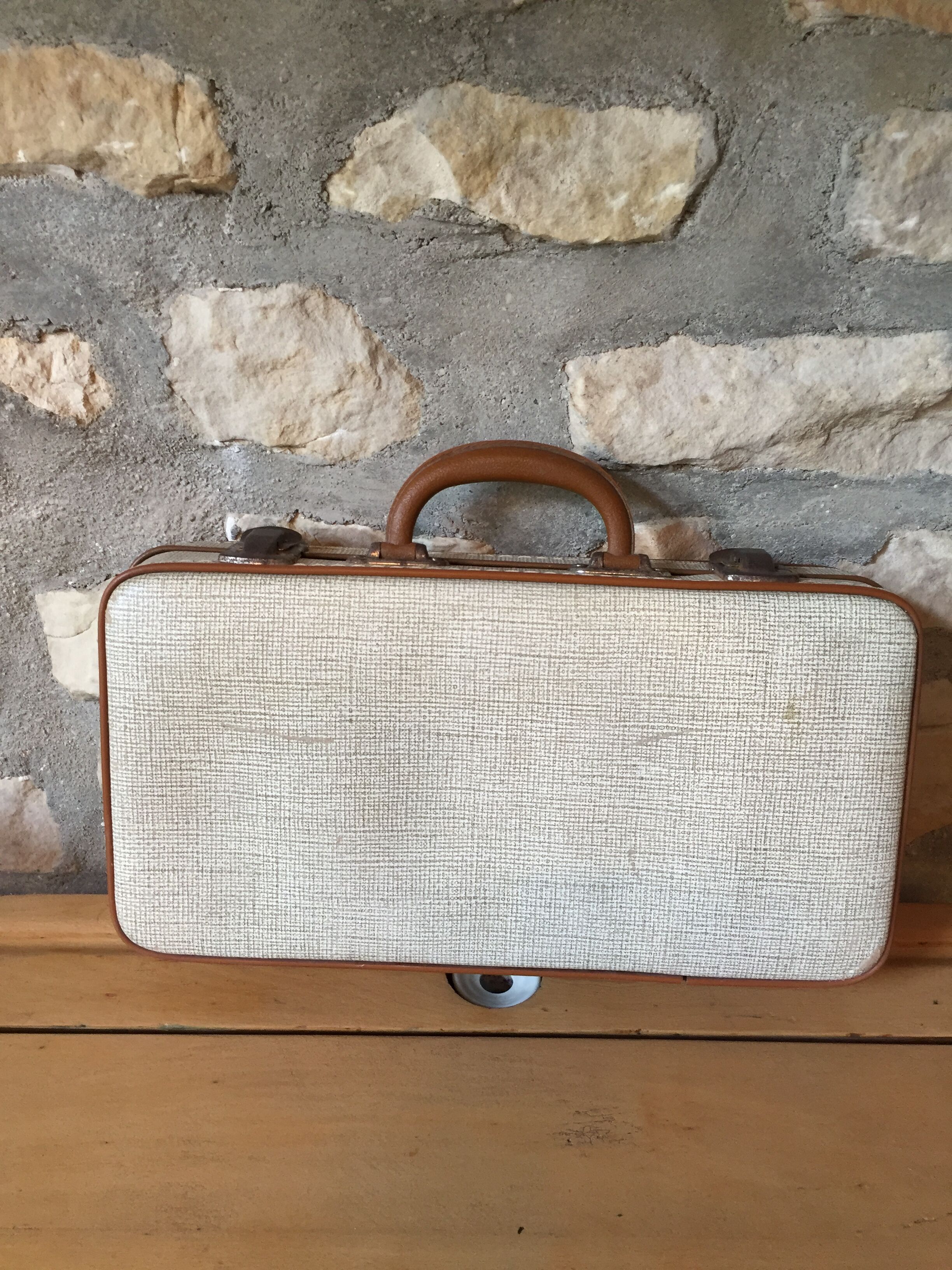 Old set of wooden balls in his suitcase