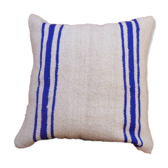 Coussin rayé bleu et blanc en laine